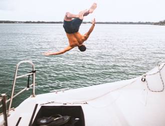 A man diving in the sea for a swim 