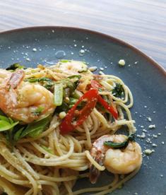 Shrimp pasta served on a grey plate